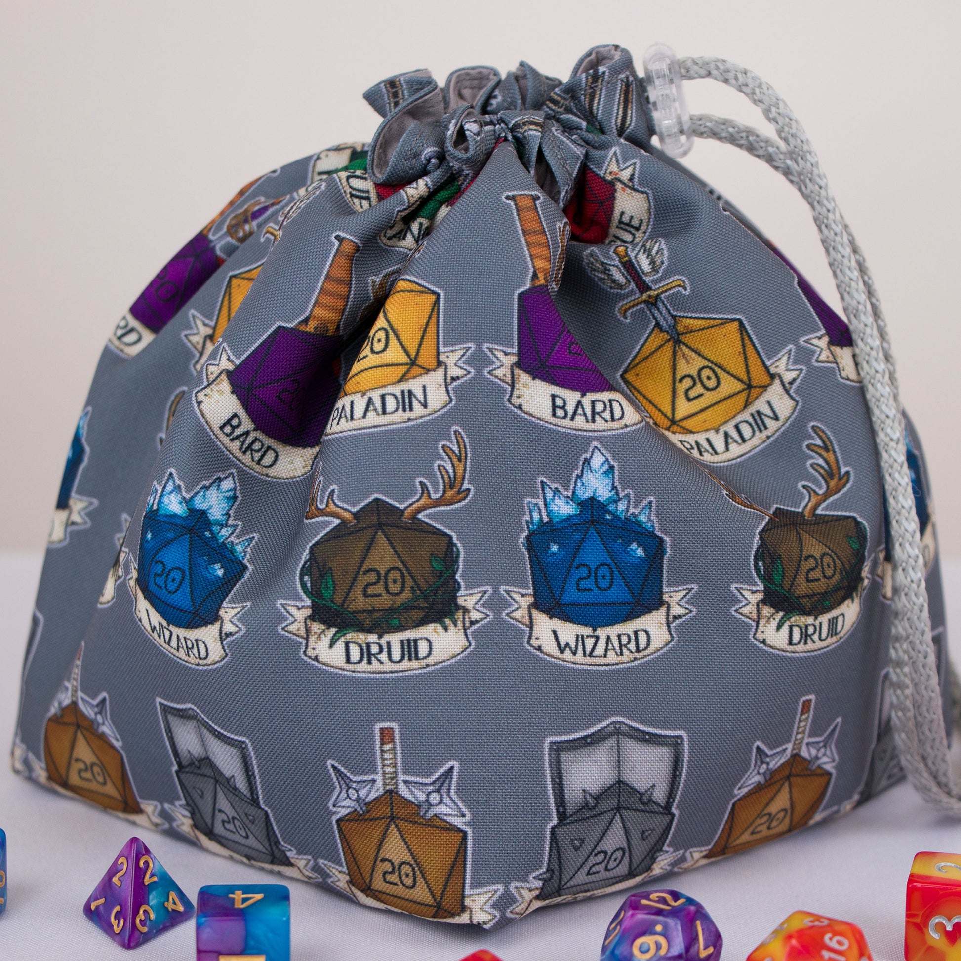 Class emblem dice bag with 6 pockets — sorts dice sets for a whole party.