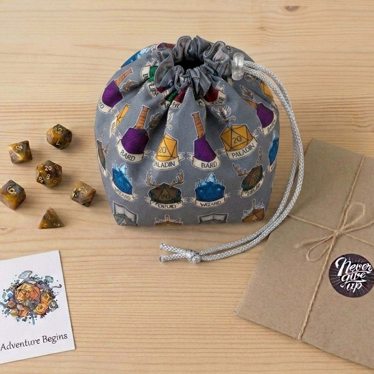 DnD party gift — class crest dice bag with pockets for a Dungeon Master, holds 300+ dice.