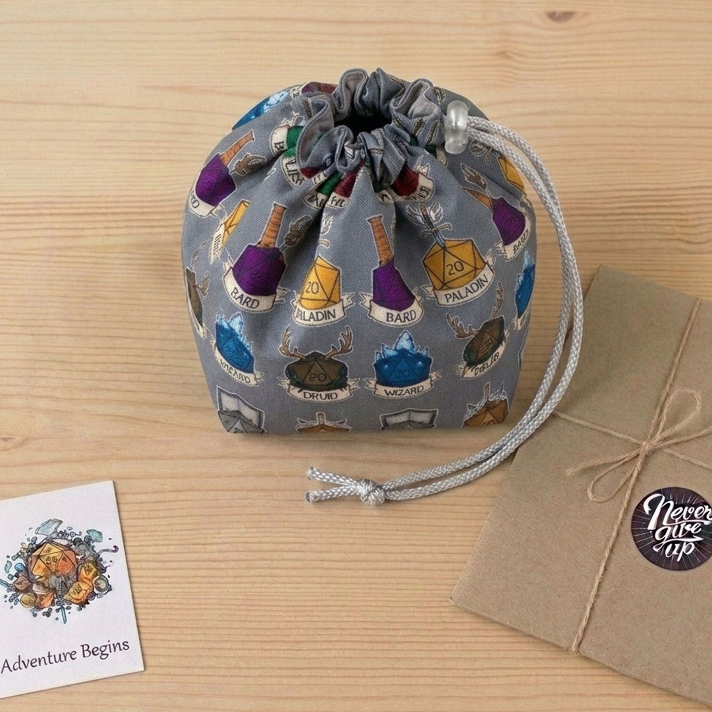 DnD party gift — class crest dice bag with pockets for a Dungeon Master, holds 300+ dice.