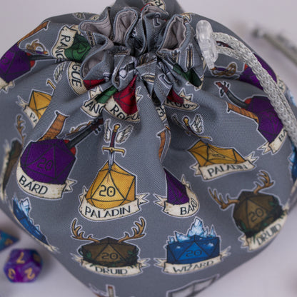 DnD class dice bag standing open — large handmade dice organizer for a Dungeon Master.