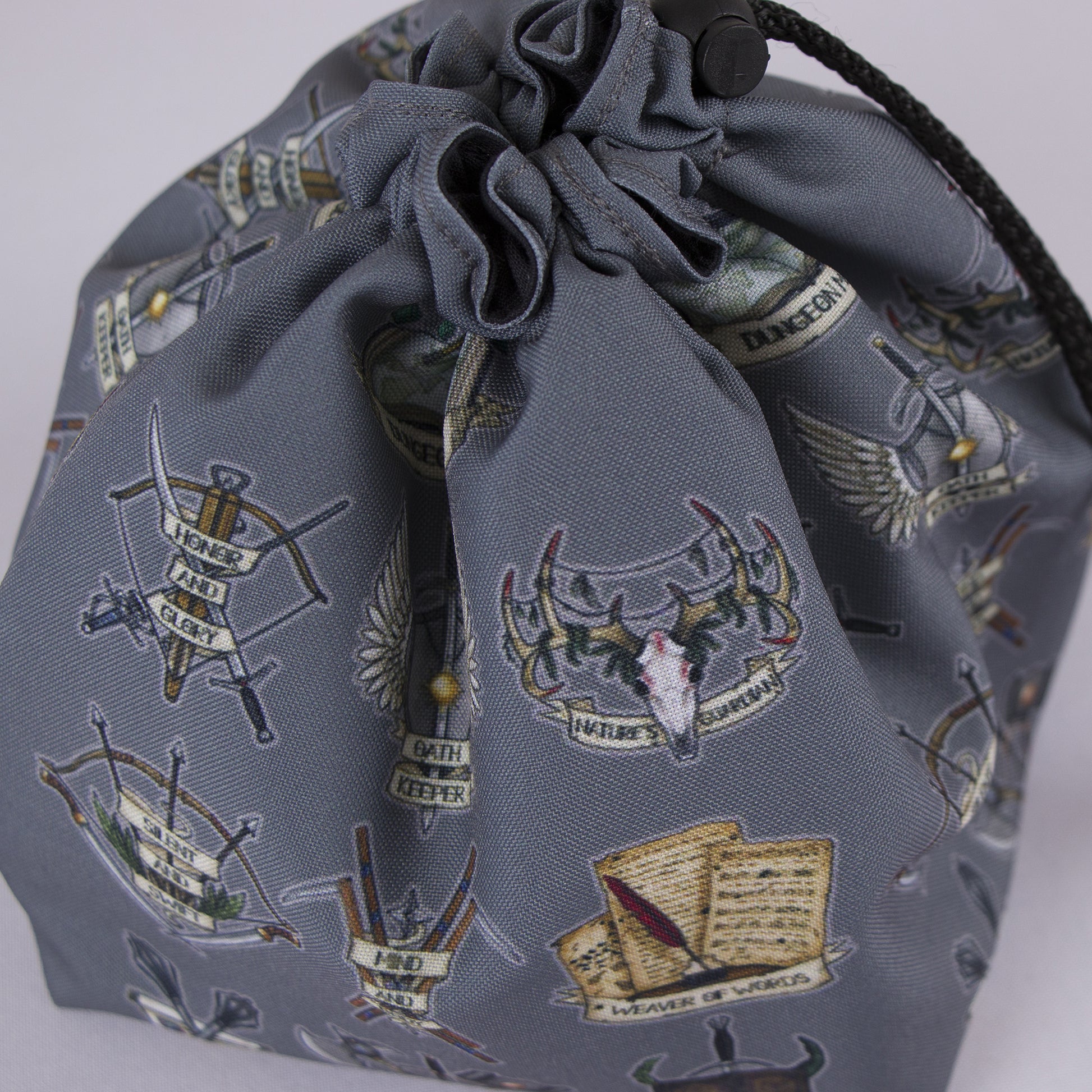 DM crest dice bag with 6 pockets — sorts dice sets for a Dungeon Master with multiple sets.