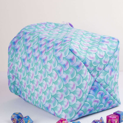 Pastel scale dice bag with rainbow pockets for sorting dice by set.