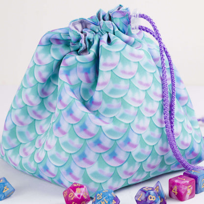 Handmade DnD birthday gift — pastel dragon scale dice bag with pockets, holds 300+ dice.