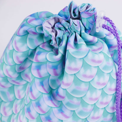 Pastel dragon scale dice bag standing open — large handmade DnD dice bag with pockets.