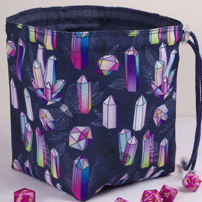 Rainbow crystal dice bag with 6 pockets — sorts dice sets for a witchy table.