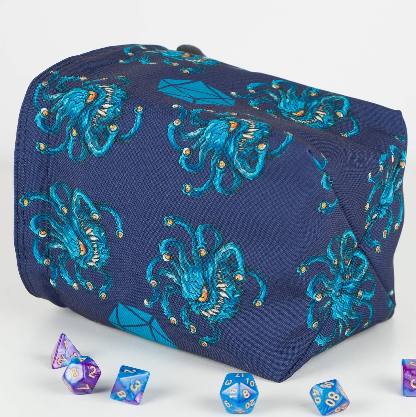 Beholder dice bag standing upright on its square base for table-side access.
