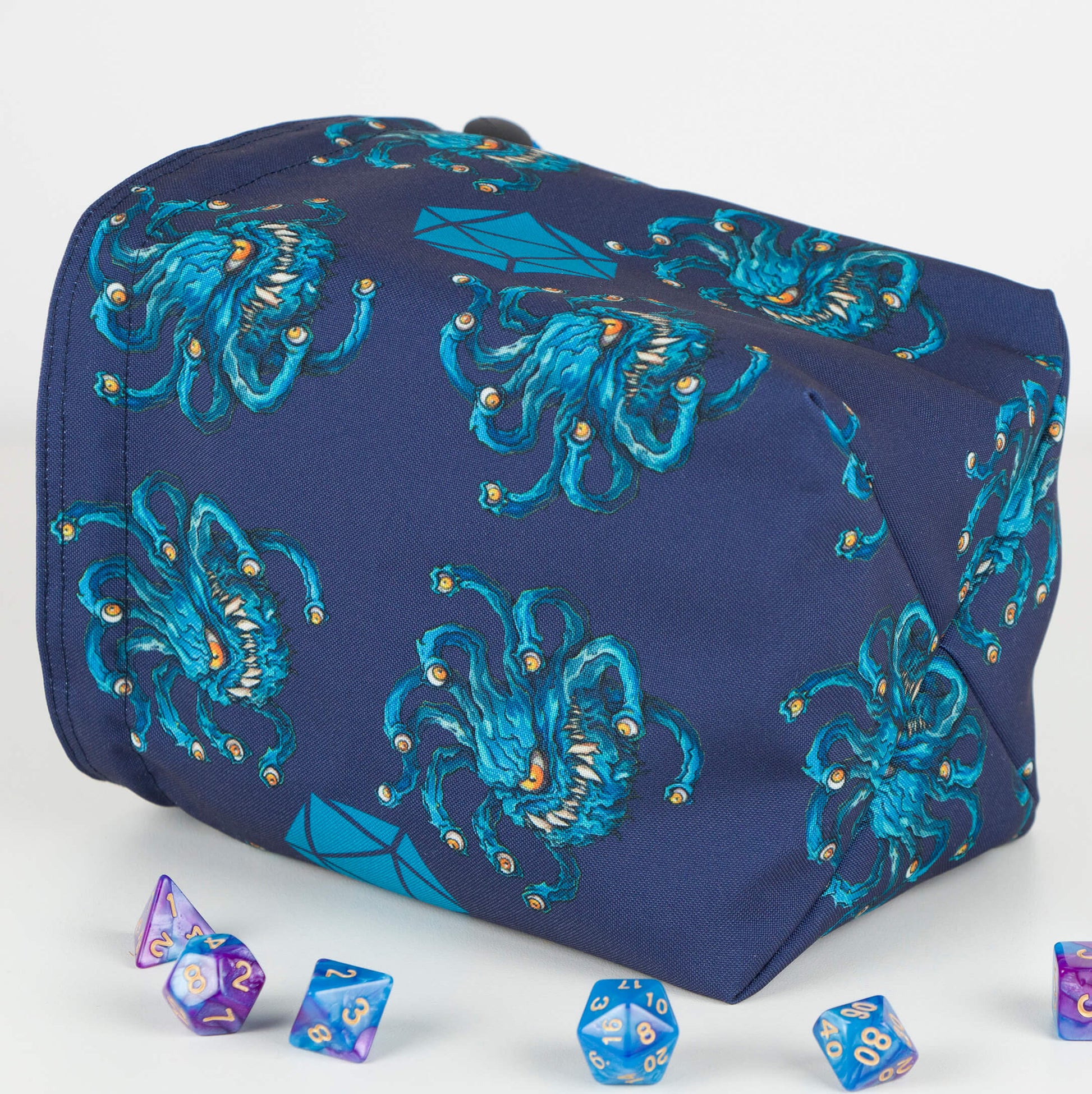 Beholder dice bag standing upright on its square base for table-side access.