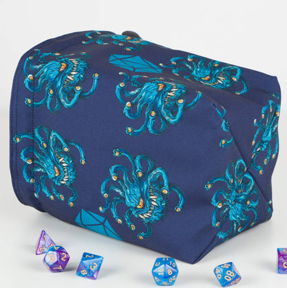 Beholder dice bag standing upright on its square base for table-side access.