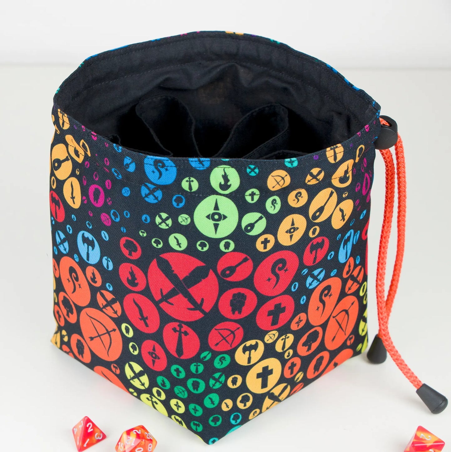 Open rainbow class icons dice bag showing the 6-pocket interior for sorting dice sets.