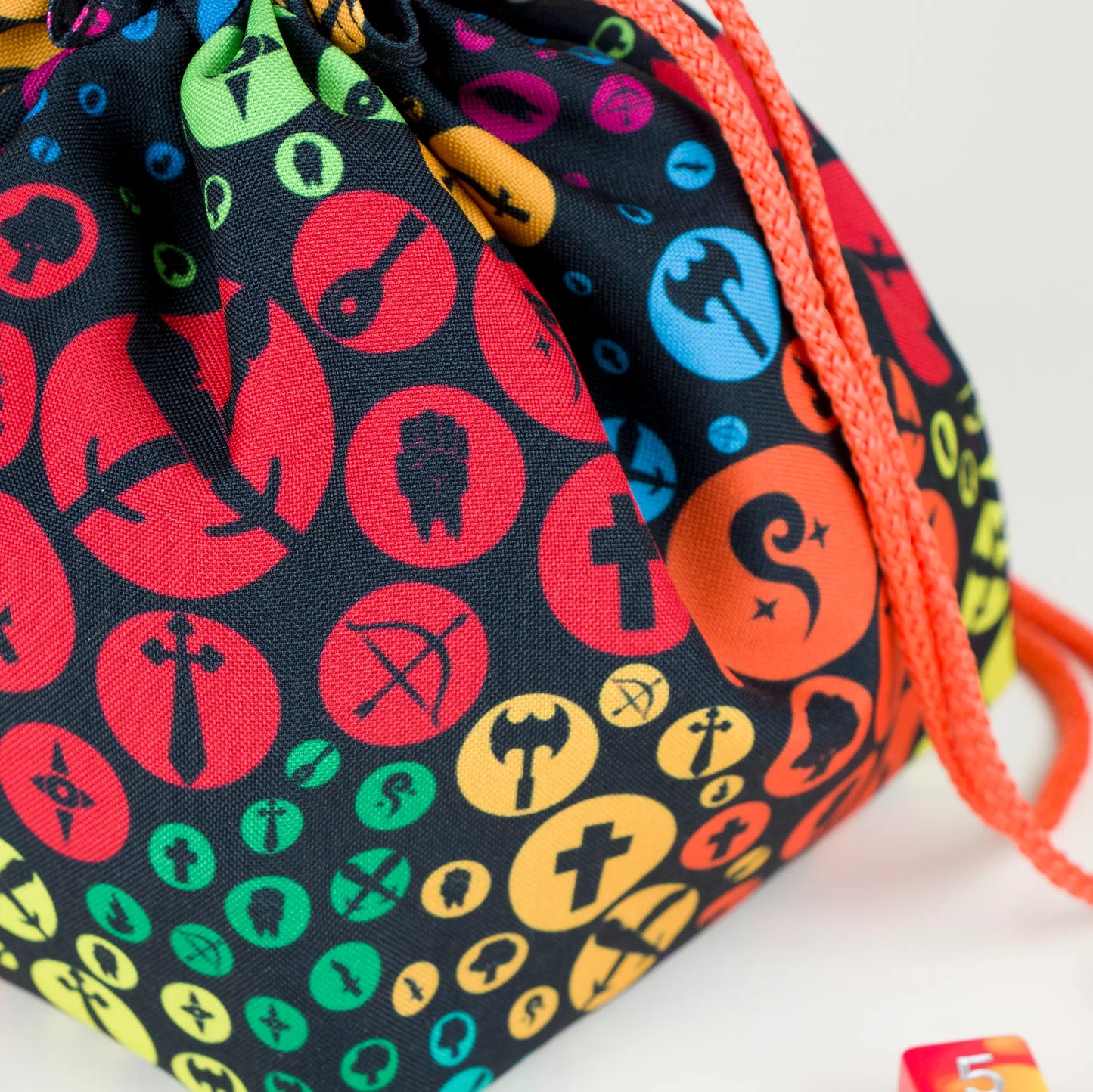 Rainbow class icons dice bag standing upright on its square base — handmade DnD organizer.