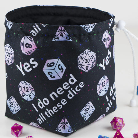 A funny DnD birthday gift — 'Yes I do need all these dice' print with pastel dice on starry black, holds 300+ dice.