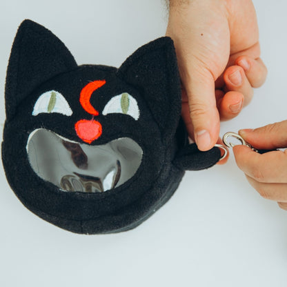 Cat ita bag — dice ita bag for pin collectors and convention-goers.