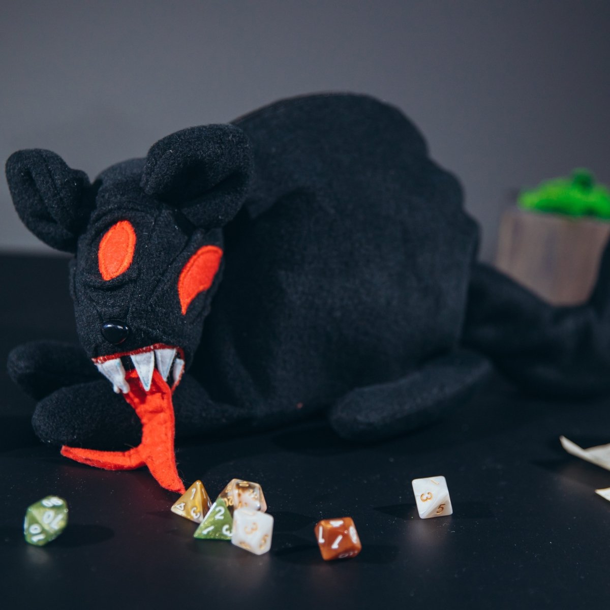 Demonic black cat plush dice bag — dnd plush dice bag that arrives looking like a gift.