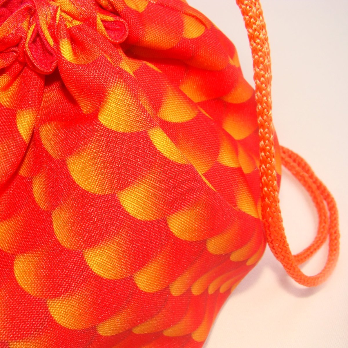 Dragon scale dice bag — large dice bag with pockets for organizing sets.