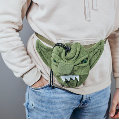 Handmade goblin plush dice bag with waist strap — wearable fleece ork pouch for DnD conventions, holds 120+ dice.