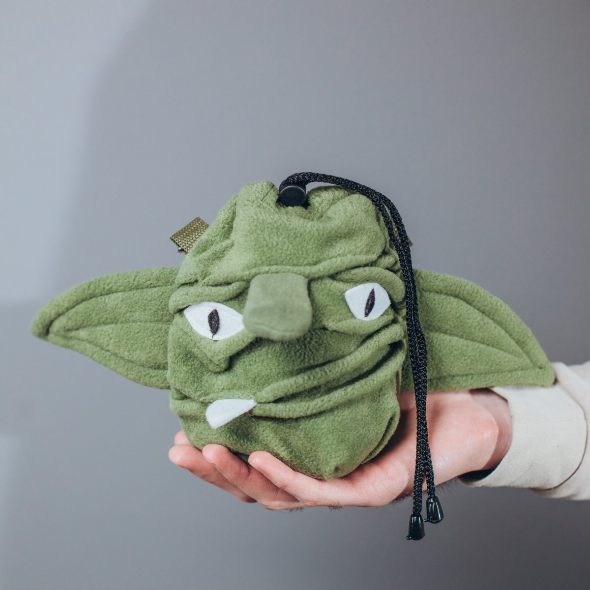 Goblin plush dice bag — wearable pouch for a dice goblin who collects sets.
