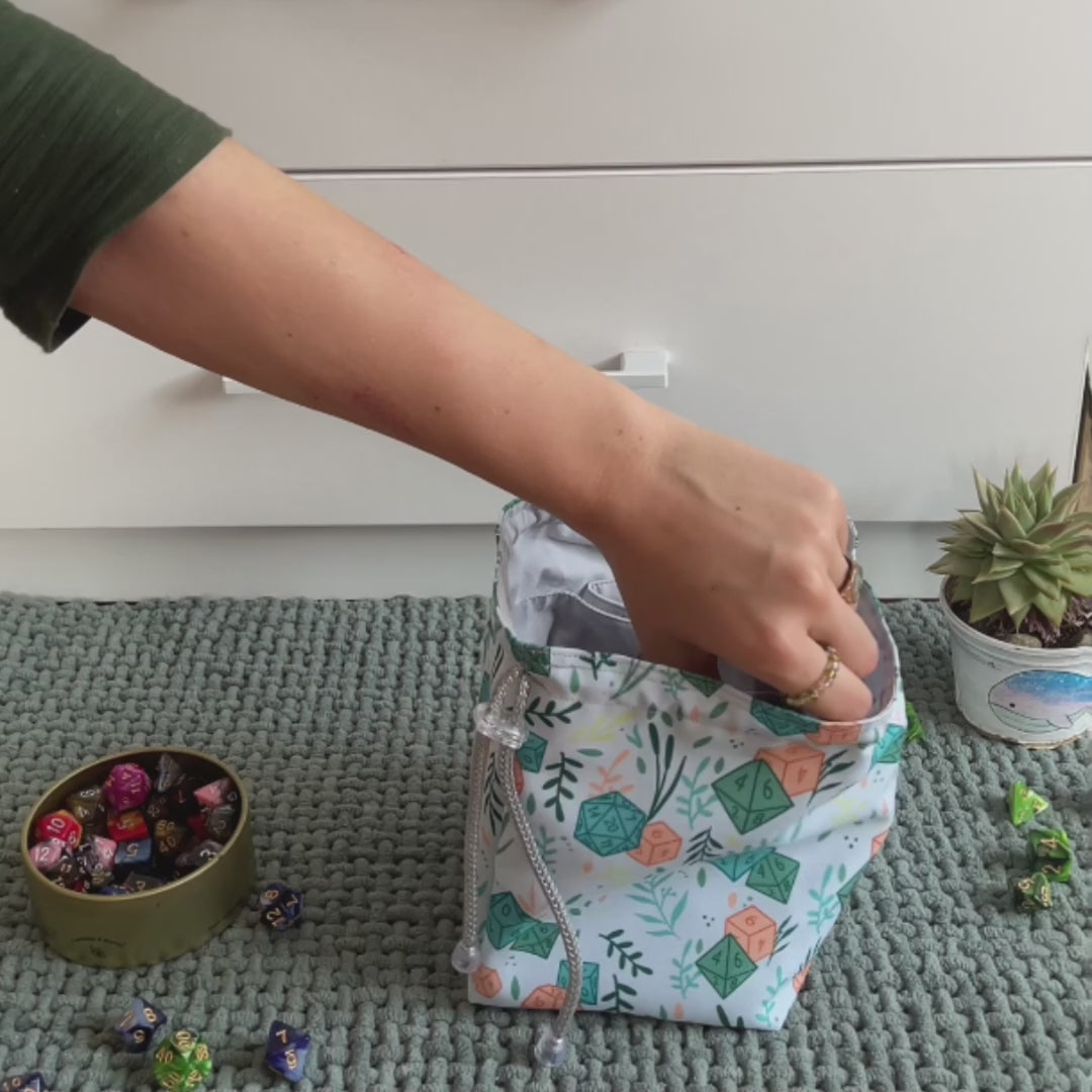 d20 dice bag with pockets showing quick access during gameplay