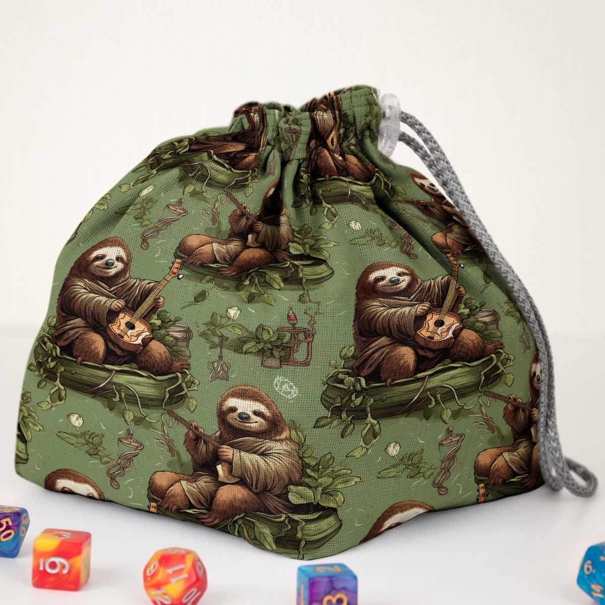 Cozy sloth dice bag with pockets — handmade gabardine DnD organizer holding 300+ dice across 6 pockets.
